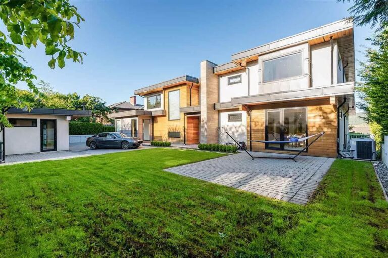 Stunning Deep Cove House with Spectacular Ocean and Mountain Views