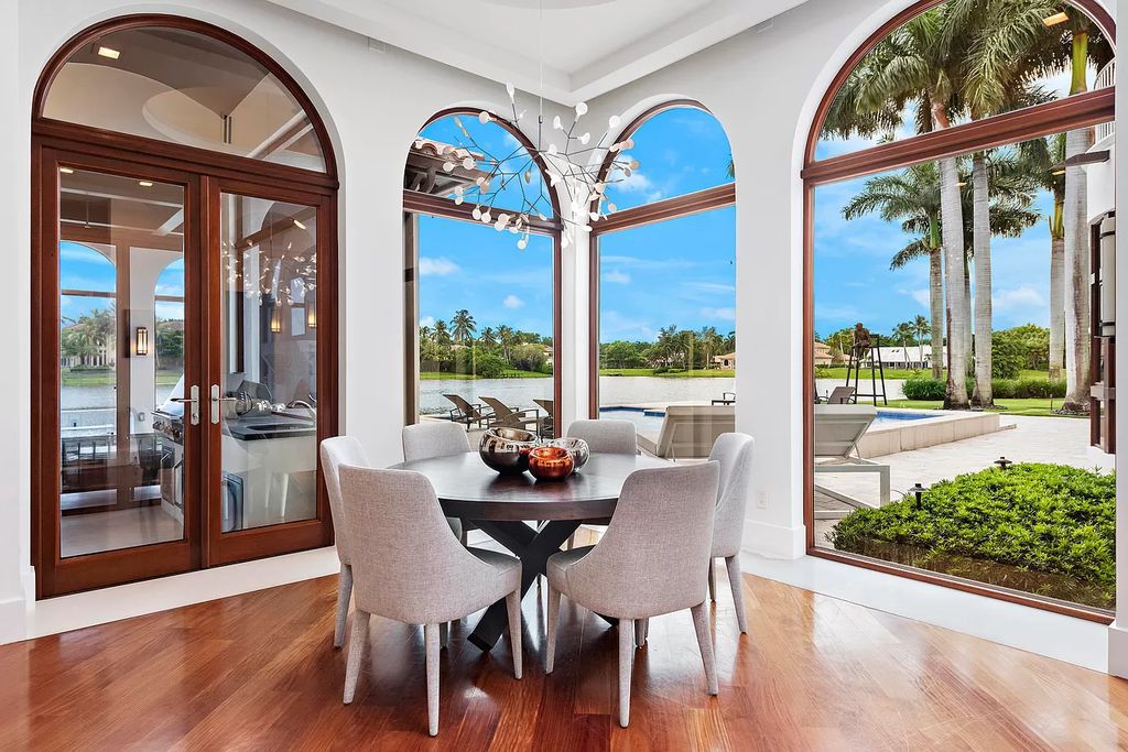 The Mediterranean Mansion in Boca Raton is a luxurious estate with over one acre on a cut-de-sac location and magnificent waterfront vistas now available for sale. This home located at 8808 Twin Lake Dr, Boca Raton, Florida
