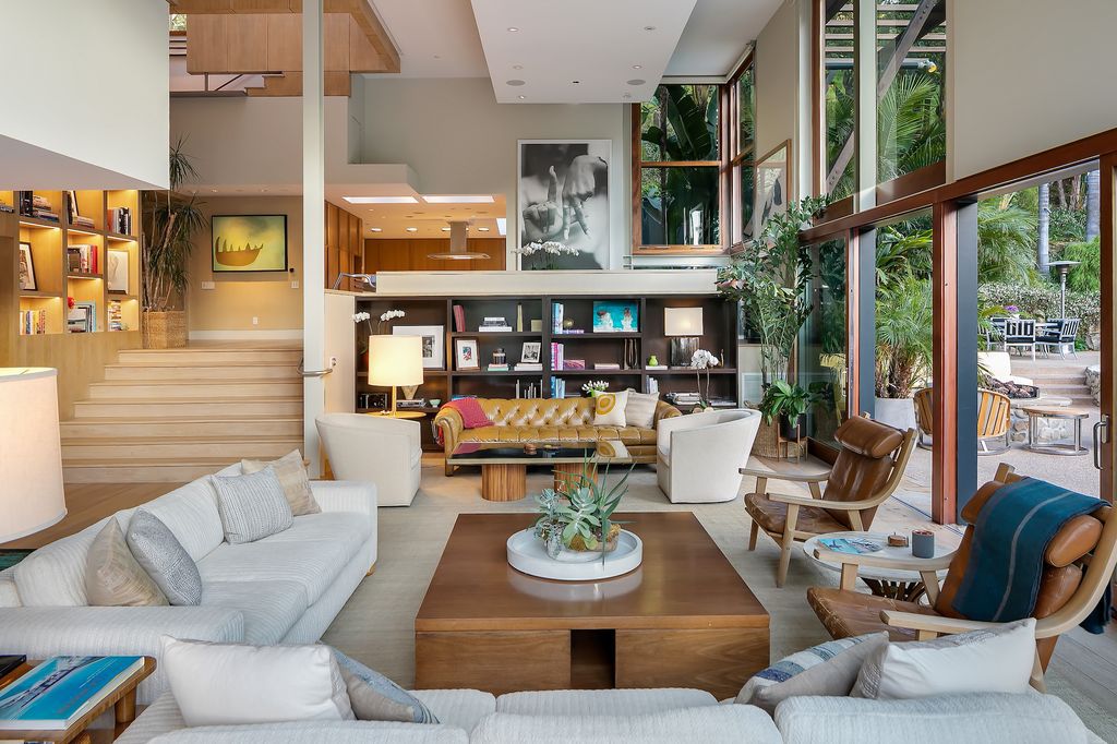 The Beverly Hills Home is a architectural compound sits behind gates on 2.38 acres on the famed Mulholland corridor now available for sale. This home located at 12835 Mulholland Dr, Beverly Hills, California