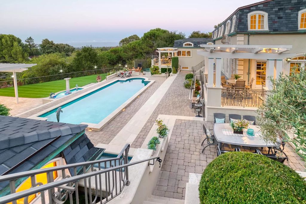 The Palo Alto Home is a gated masterpiece is created for the ultimate Silicon Valley lifestyle showcasing breathtaking natural beauty now available for sale. This home located at 890 Robb Rd, Palo Alto, California