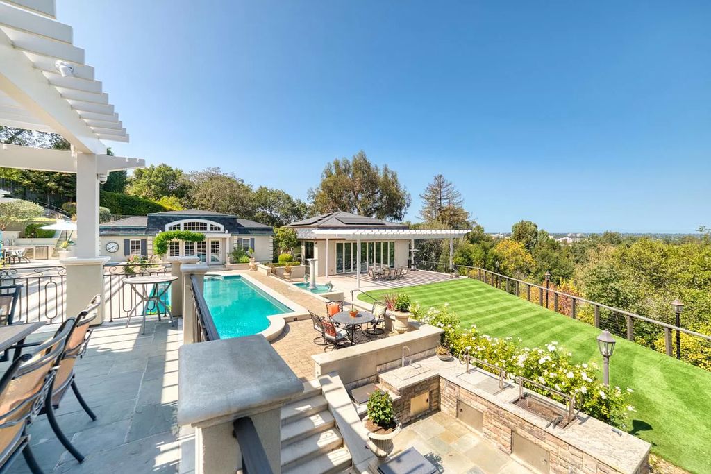 The Palo Alto Home is a gated masterpiece is created for the ultimate Silicon Valley lifestyle showcasing breathtaking natural beauty now available for sale. This home located at 890 Robb Rd, Palo Alto, California