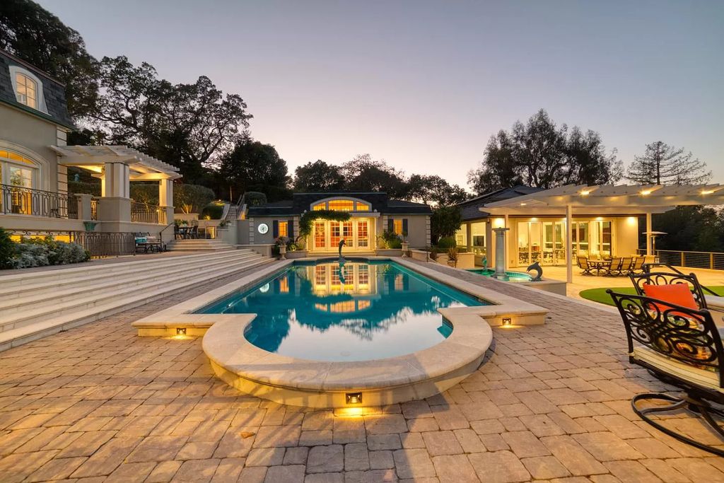 The Palo Alto Home is a gated masterpiece is created for the ultimate Silicon Valley lifestyle showcasing breathtaking natural beauty now available for sale. This home located at 890 Robb Rd, Palo Alto, California