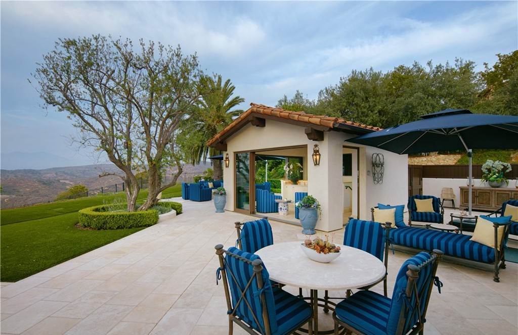 The Estate in Southern California is a magnificent home with museum-quality interiors and are accoutered with carefully sourced materials now available for sale. This home located at 76 Golden Eagle, Irvine, California