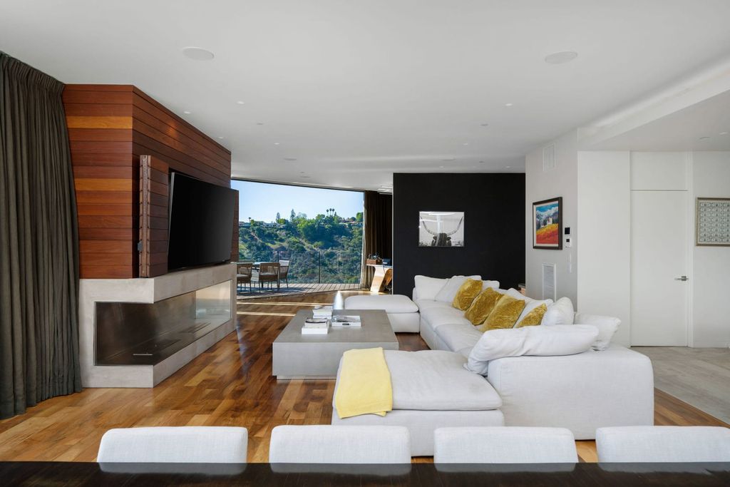 The Home in Los Angeles is a distinguished architectural masterpiece sited in prime Bel Air boasts panoramic city, ocean, and mountain views now available for sale. This home located at 1979 Stradella Rd, Los Angeles, California