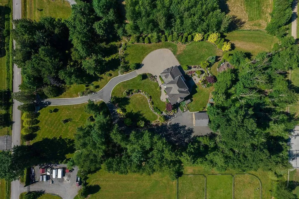 The Luxurious Campbell Valley Estate is an entertainer's dream home now available for sale. This home is located at 992 212th St, Langley, BC V2Z 1T1, Canada