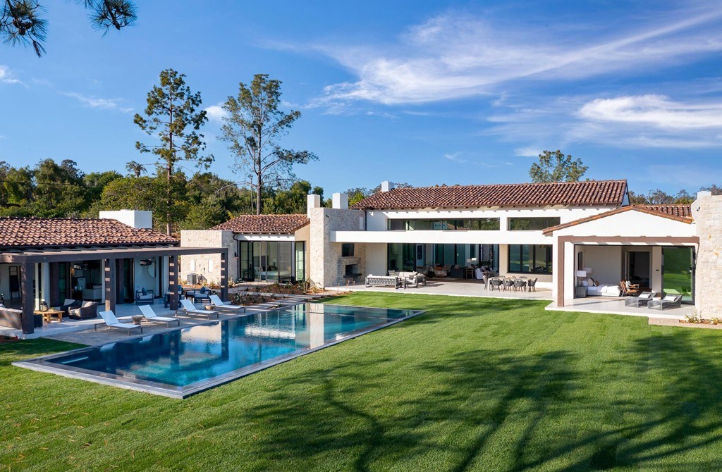 The Home in Rancho Santa Fe is a brand new estate with An impressive open-living great room boasts a soaring ceiling now available for sale. This home located at 16836 El Zorro Vis, Rancho Santa Fe, California