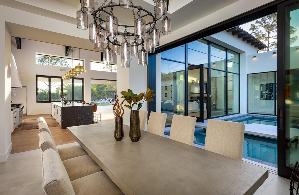 The Home in Rancho Santa Fe is a brand new estate with An impressive open-living great room boasts a soaring ceiling now available for sale. This home located at 16836 El Zorro Vis, Rancho Santa Fe, California