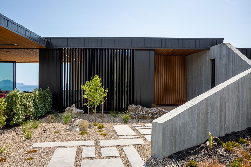 Waipu Home, Elegant L-Shape with Coastal Views by Jessop Architects