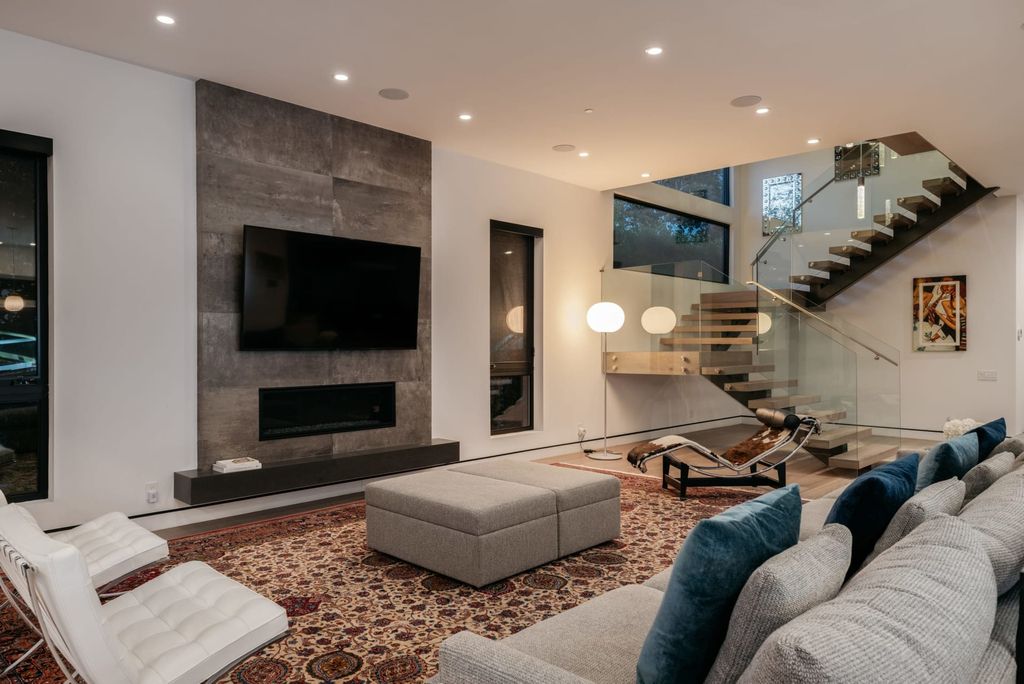 The Los Angeles Home is a beautifully scaled newer construction smart property has rooftop deck with fireplace, city and mountain views now available for sale. This home located at 439 N Martel Ave, Los Angeles, California;