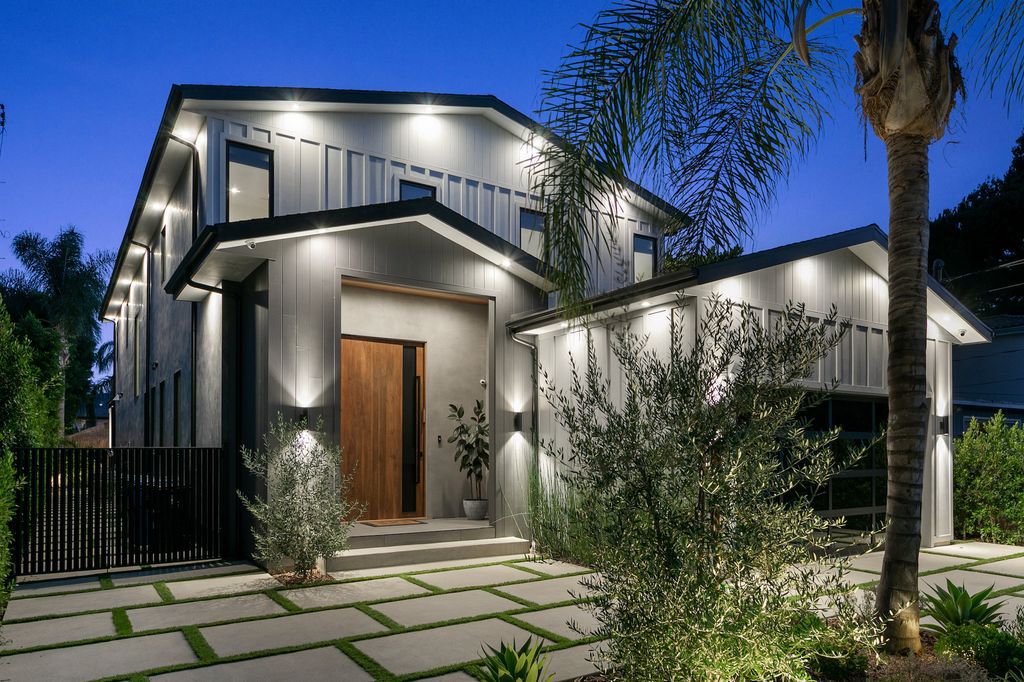 The Farmhouse in Studio City is a luxurious home has grand formal living area with beautiful custom built-ins & a dining space with a wine display now available for sale. This home located at 12818 Landale St, Studio City, California;