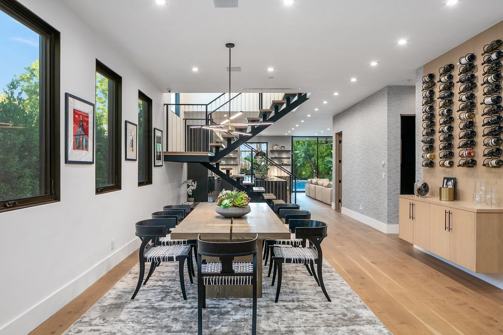 The Farmhouse in Studio City is a luxurious home has grand formal living area with beautiful custom built-ins & a dining space with a wine display now available for sale. This home located at 12818 Landale St, Studio City, California;