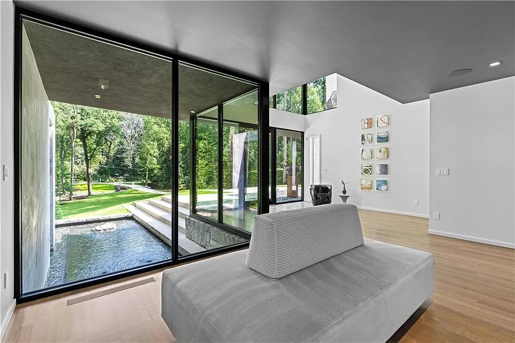 The Extraordinary Modern Residence in Atlanta is a dream home now available for sale. This home is located at 1085 Ferncliff Rd NE, Atlanta, Georgia