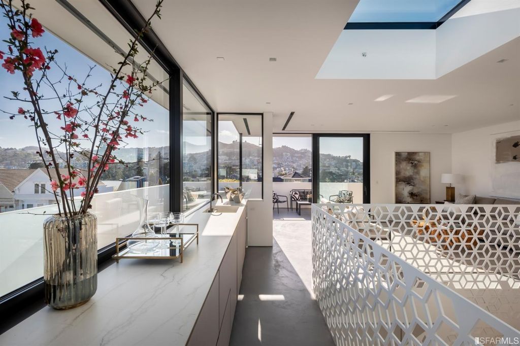 The Home in San Francisco is a meticulously reimagined and modernized five-bedroom, five-and-a-half-bathroom luxury residence now available for sale. This home located at 3790 21st St, San Francisco, California