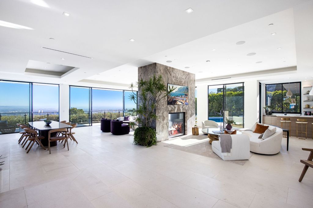 The Home in Beverly Hills is a contemporary masterpiece located on one of the most desirable streets with unobstructed views now available for sale. This home located at 1505 Carla Rdg, Beverly Hills, California
