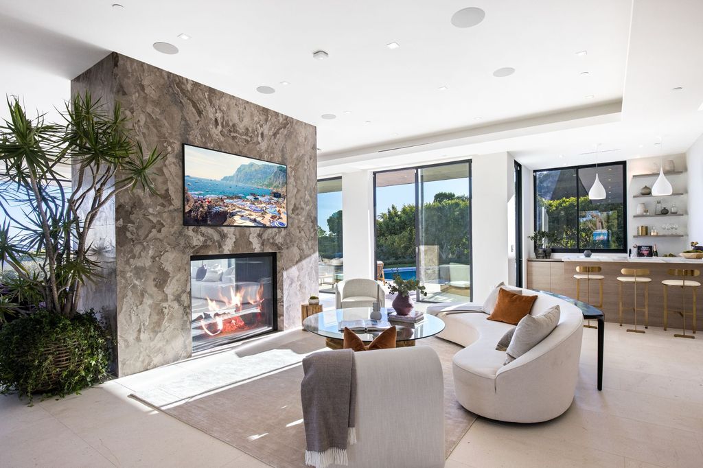 The Home in Beverly Hills is a contemporary masterpiece located on one of the most desirable streets with unobstructed views now available for sale. This home located at 1505 Carla Rdg, Beverly Hills, California