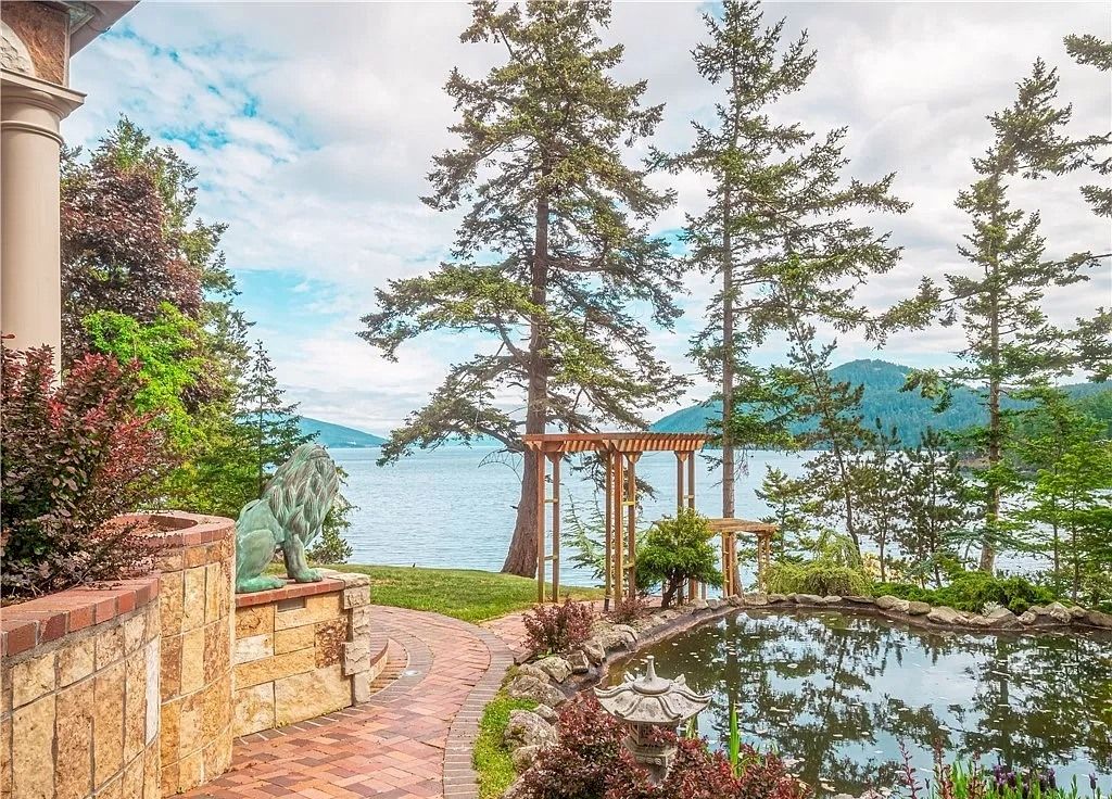 The Secluded Waterfront Stone Mansion in Washington is a beautiful home now available for sale. This home is located at 995 Deer Point Rd, Olga,  Washington