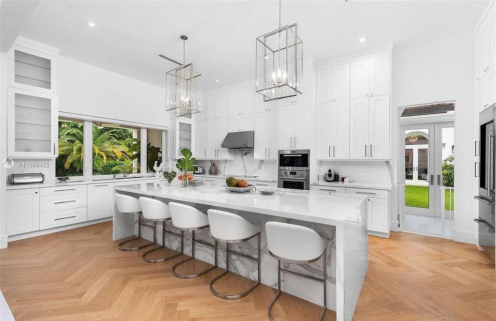 The Home in Miami is a spectacular transitional modern new construction situated in the heart of Pinecrest commanding a premium picturesque now available for sale. This home located at 12520 SW 63rd Ave, Miami, Florida