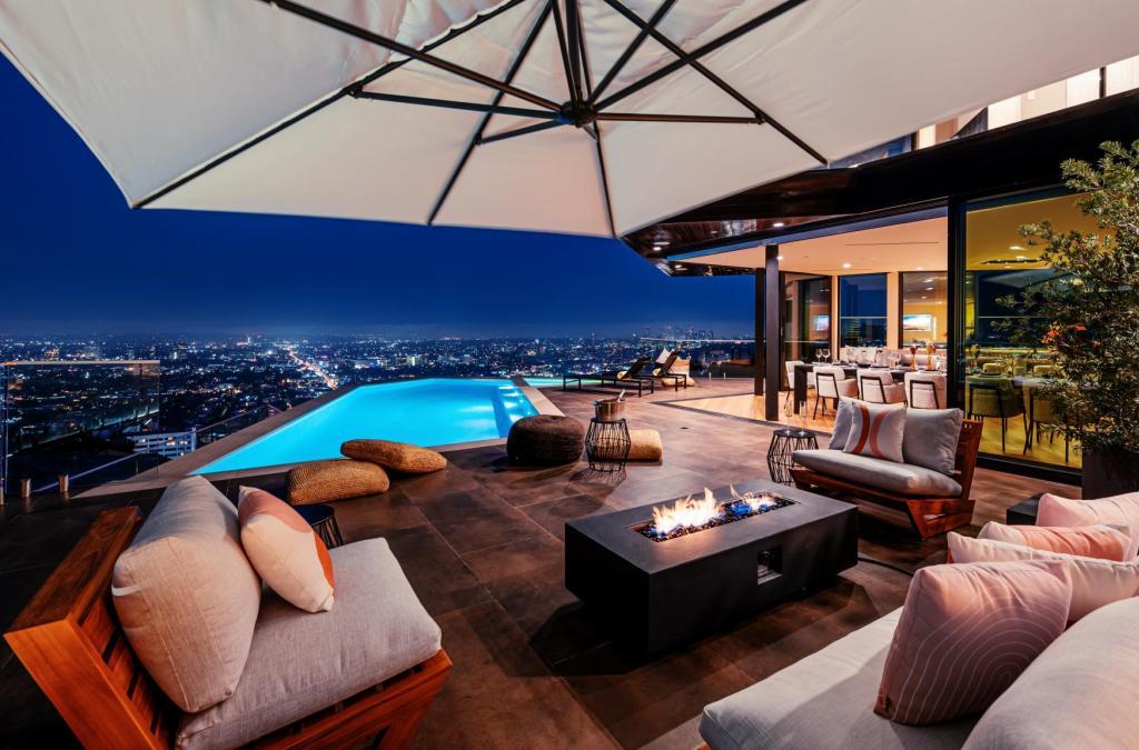 The Hollywood Hills Home is a brand new luxurious property offers a unique architectural, visual and lifestyle experience now available for sale. This home located at 8542 Hollywood Blvd, Los Angeles, California