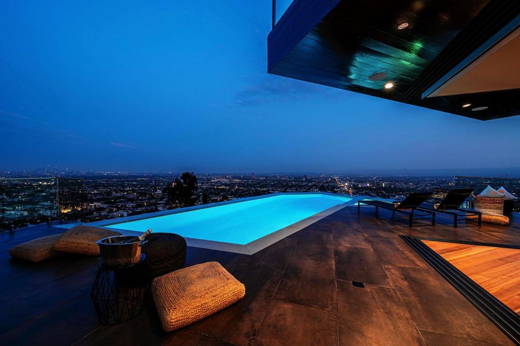 The Hollywood Hills Home is a brand new luxurious property offers a unique architectural, visual and lifestyle experience now available for sale. This home located at 8542 Hollywood Blvd, Los Angeles, California