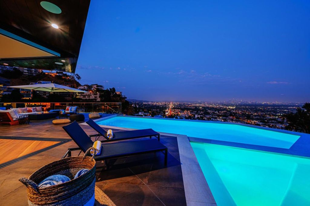 The Hollywood Hills Home is a brand new luxurious property offers a unique architectural, visual and lifestyle experience now available for sale. This home located at 8542 Hollywood Blvd, Los Angeles, California