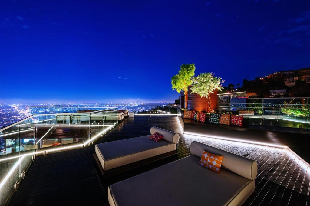 The Hollywood Hills Home is a brand new luxurious property offers a unique architectural, visual and lifestyle experience now available for sale. This home located at 8542 Hollywood Blvd, Los Angeles, California