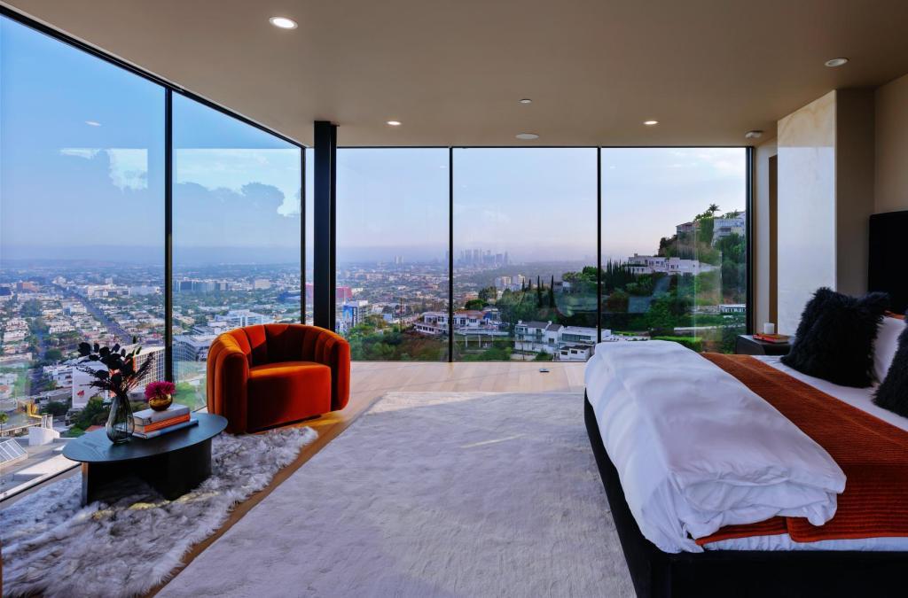 The Hollywood Hills Home is a brand new luxurious property offers a unique architectural, visual and lifestyle experience now available for sale. This home located at 8542 Hollywood Blvd, Los Angeles, California