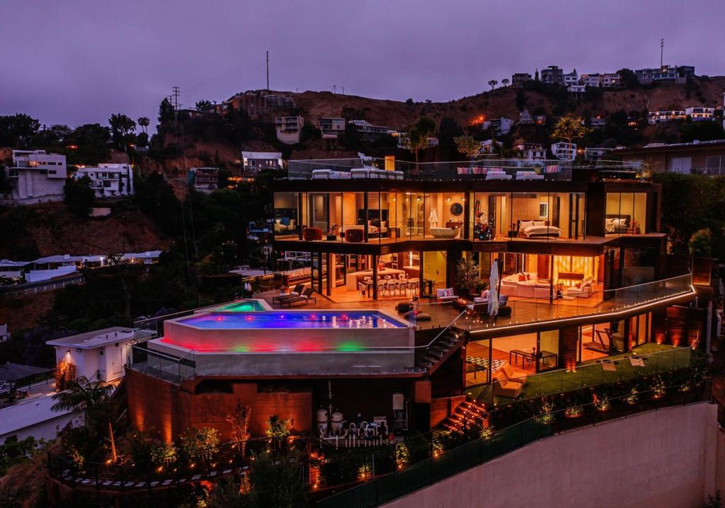 The Hollywood Hills Home is a brand new luxurious property offers a unique architectural, visual and lifestyle experience now available for sale. This home located at 8542 Hollywood Blvd, Los Angeles, California