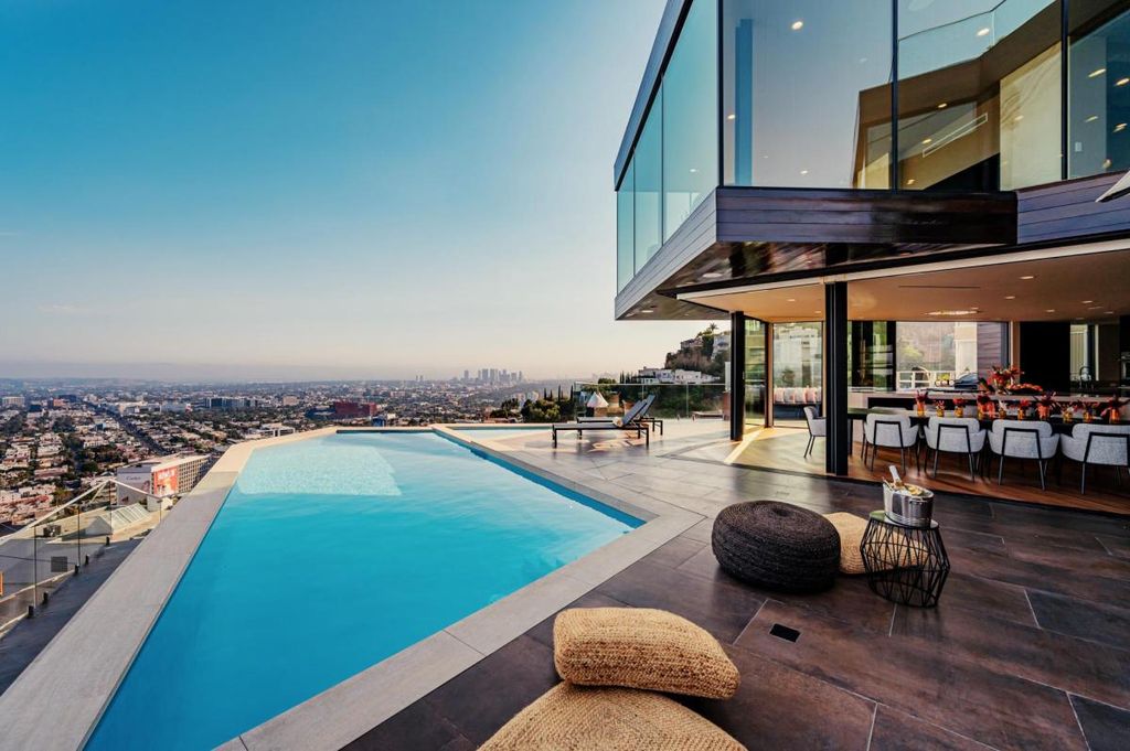 The Hollywood Hills Home is a brand new luxurious property offers a unique architectural, visual and lifestyle experience now available for sale. This home located at 8542 Hollywood Blvd, Los Angeles, California