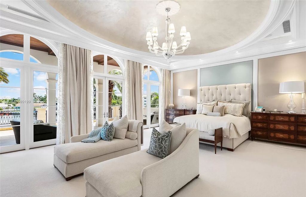 The Boca Raton Mansion is a one of a kind waterfront point lot located in Royal Palm Yacht & Country Club with the ultimate entertaining space now available for sale. This home located at 130 W Coconut Palm Rd, Boca Raton, Florida