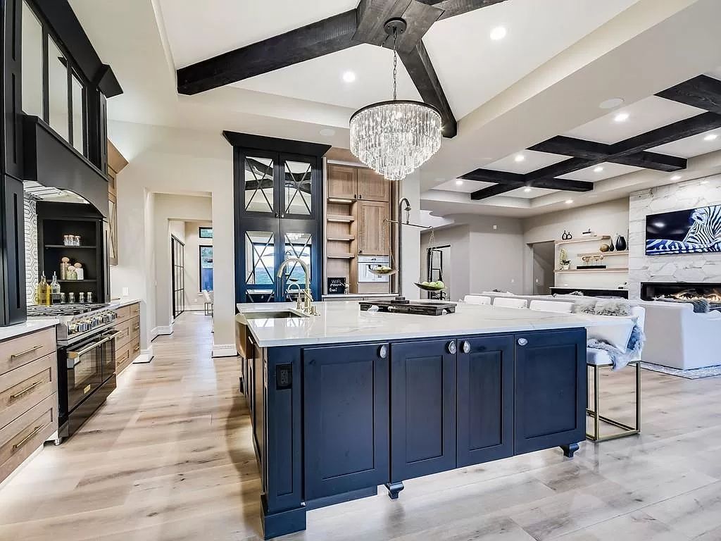 The Texas Home is a newly luxurious home with Restoration Hardware furniture and light fixtures, chandeliers throughout now available for sale. This home located at 6100 Lantern View Dr, Leander, Texas