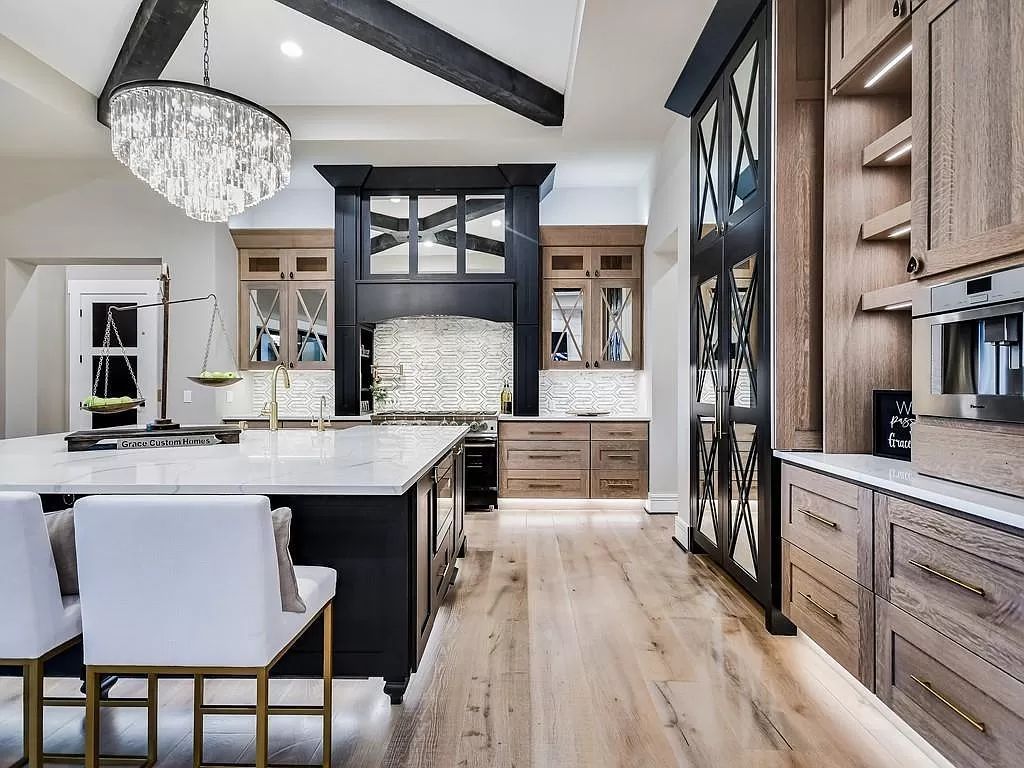 The Texas Home is a newly luxurious home with Restoration Hardware furniture and light fixtures, chandeliers throughout now available for sale. This home located at 6100 Lantern View Dr, Leander, Texas