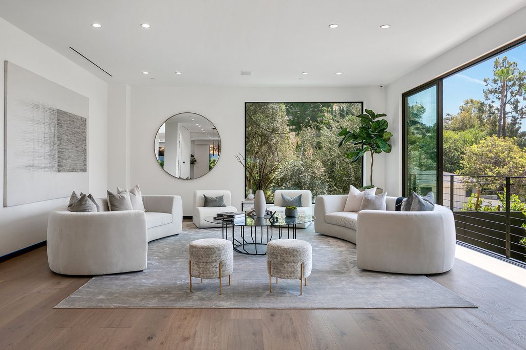 The Contemporary Home in Los Angeles is a brand new construction with incredible scale, and flooded with an abundance of natural light now available for sale. This home located at 1461 Rising Glen Rd, Los Angeles, California;