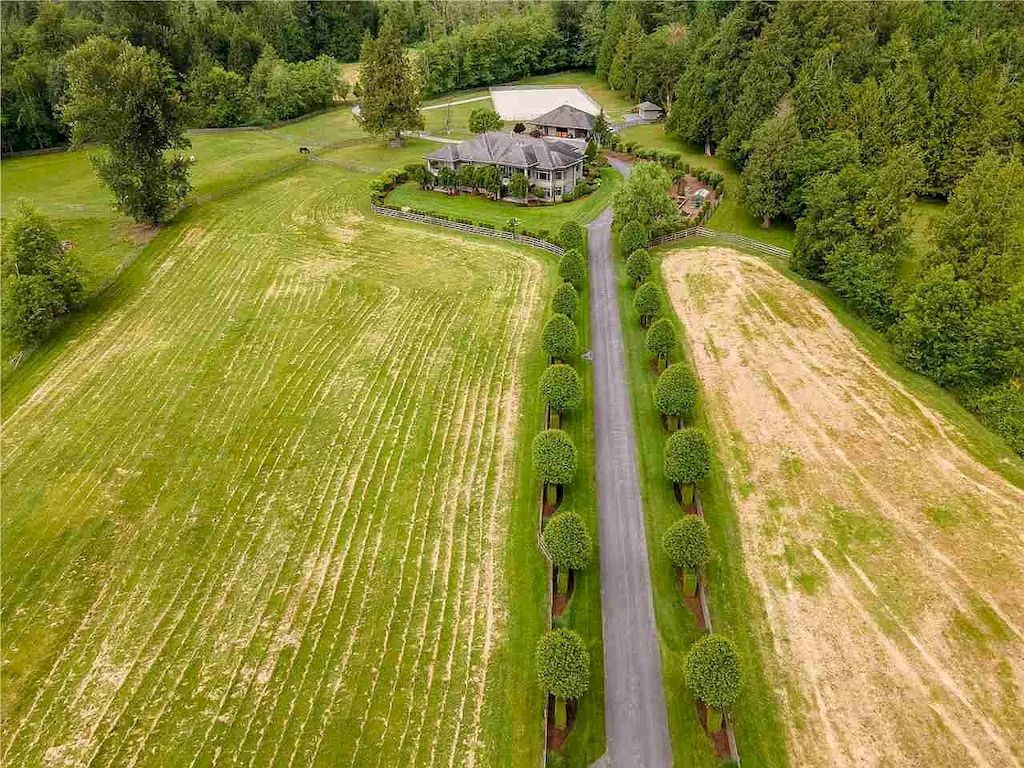 The Magical Langley Estate is an exclusive trophy property now available for sale. This home is located at 2675 256th St, Langley, BC V4W 1Y3, Canada