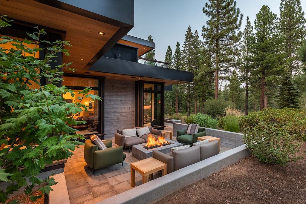 The Martis Camps Home is a stunning retreat with a beautiful great room and supported by a dining room and an elegant kitchen with a large counter now available for sale. This home located at 8324 Kenarden Dr, Truckee, California;