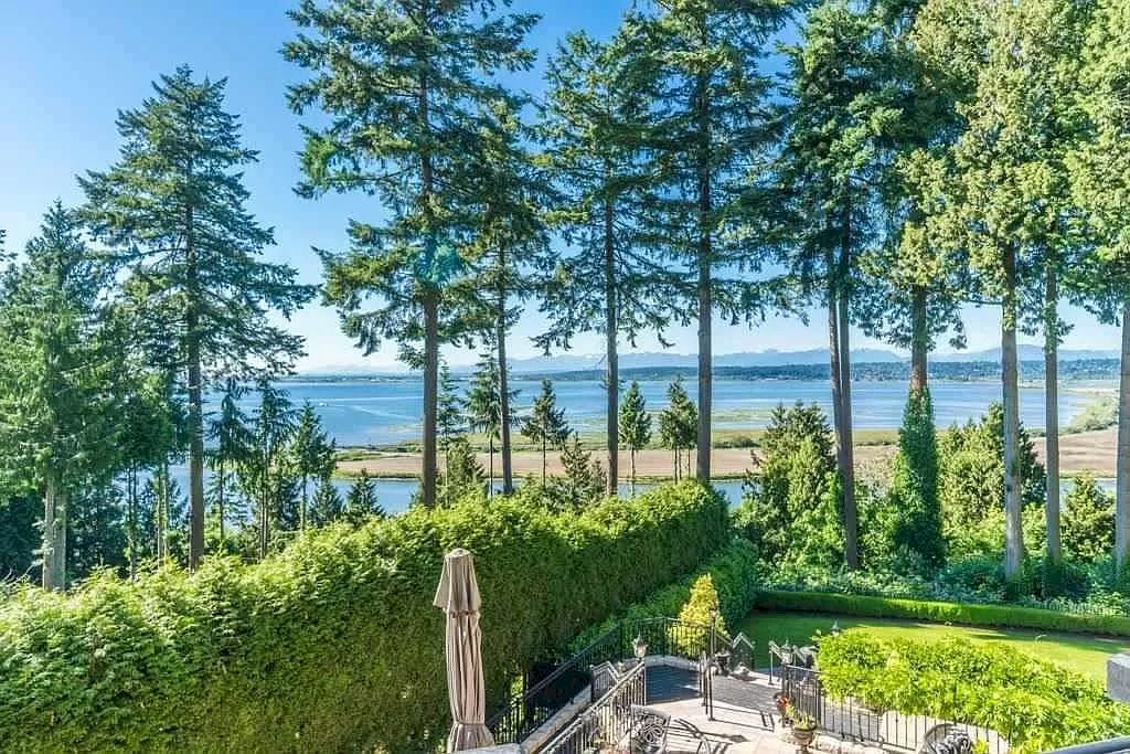 The Tuscan Style Home in Surrey is a high-quality custom-built waterfront house now available for sale. This home is located at 13011 Crescent Rd, Surrey, BC V4P 1J6, Canada