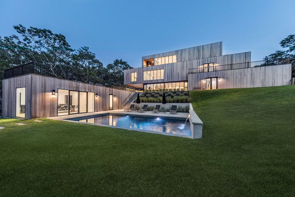 Modern new construction house in New York sets on 1.8 acres of lushly landscaped lot sells for $4,750,000