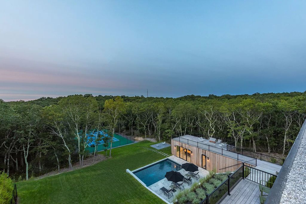 Modern new construction house in New York sets on 1.8 acres of lushly landscaped lot sells for $4,750,000