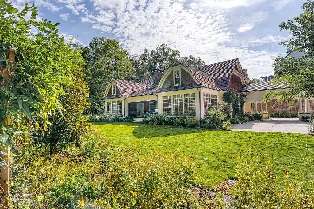 This $3,800,000 New England Coastal Style Home in Georgia Shows off Beautiful Gardens and Interior Allurement