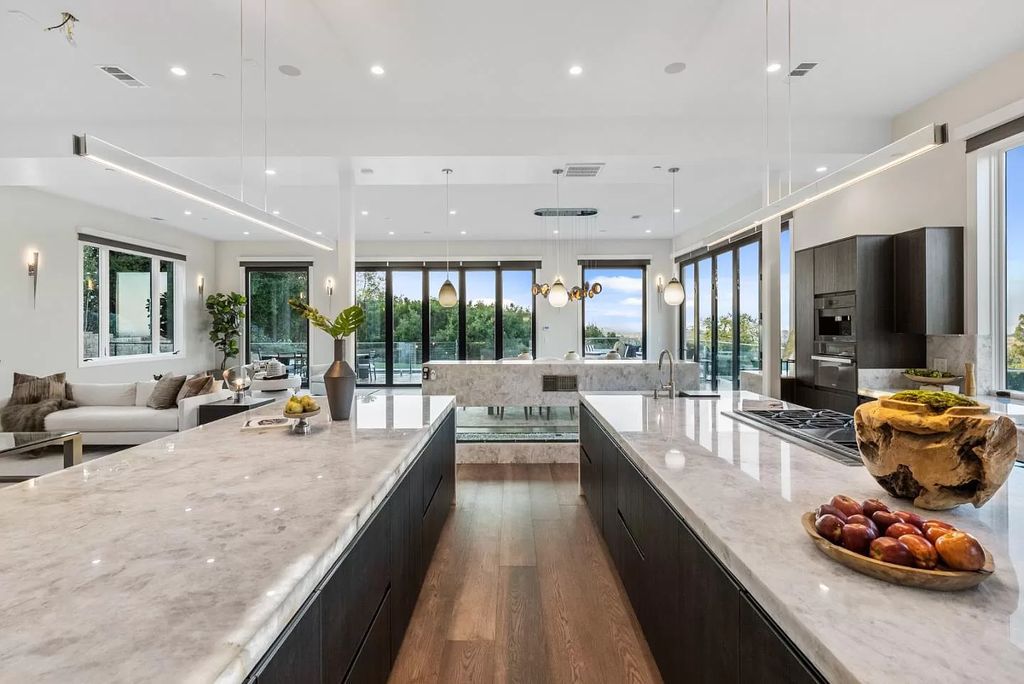 The Home in Los Altos is a modern masterpiece set in Los Altos Hills boasts unmatched attention to detail and uninhibited Bay views now available for sale. This home located at 27447 Edgerton Rd, Los Altos, California