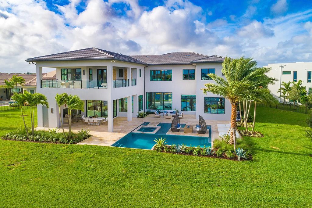 The Boca Raton Home is a Contemporary estate on a magnificent point pie lot with spectacular lake view in Boca Bridges now available for sale. This home located at 17230 Brulee Breeze Way, Boca Raton, Florida