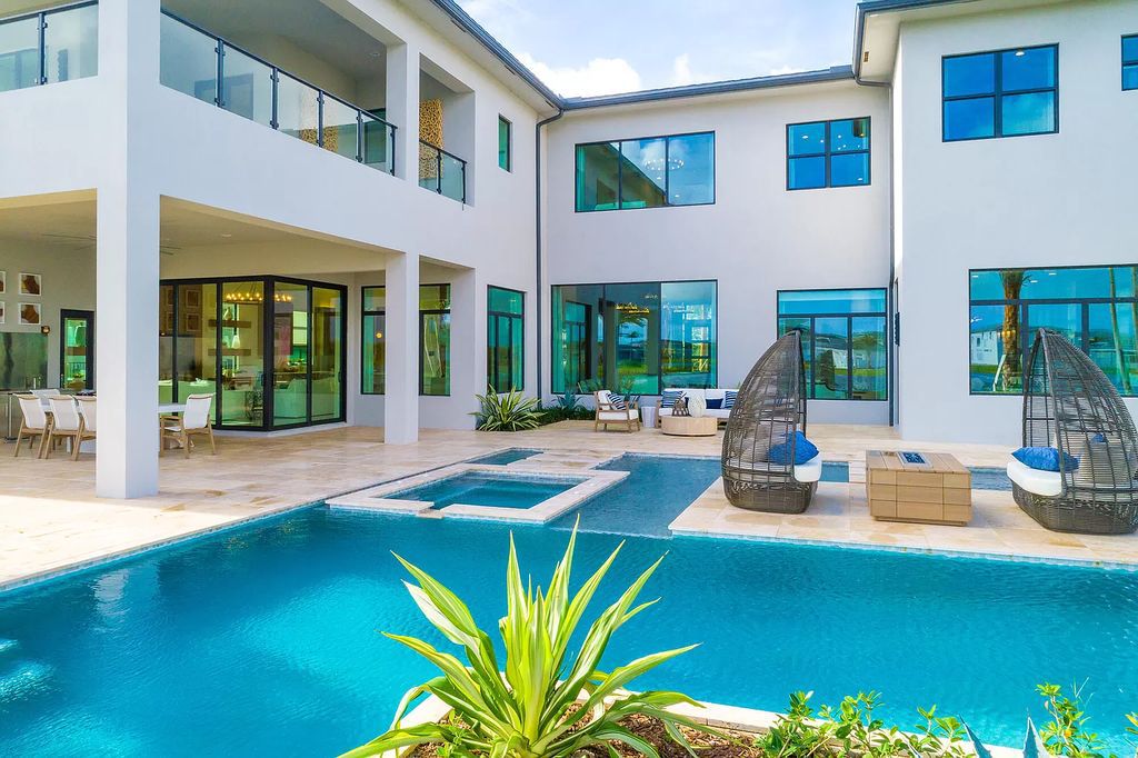 The Boca Raton Home is a Contemporary estate on a magnificent point pie lot with spectacular lake view in Boca Bridges now available for sale. This home located at 17230 Brulee Breeze Way, Boca Raton, Florida