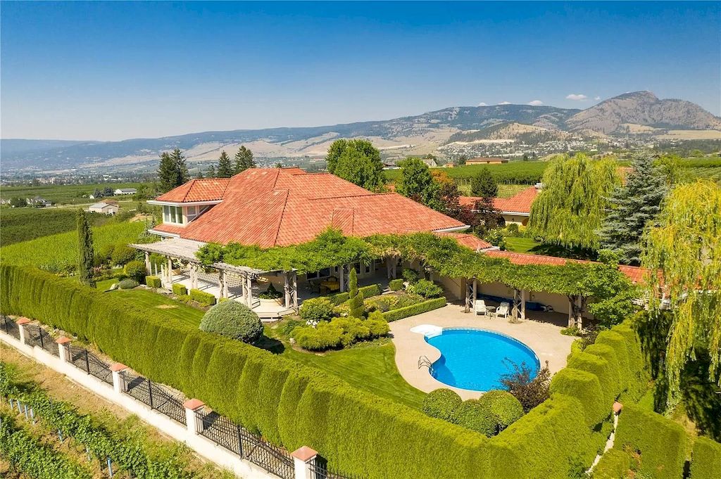 The Charming Italian Style Villa in Kelowna is a private country estate now available for sale. This home is located at 3240 Pooley Rd, Kelowna, BC V1W 4G7, Canada