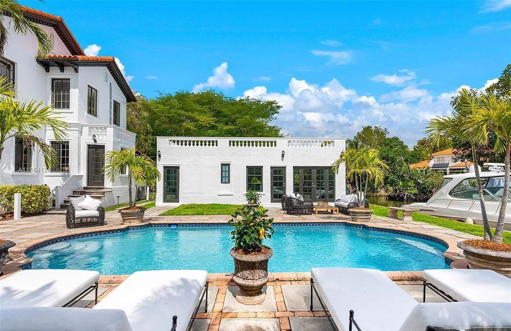 The Home in Miami is a meticulously updated historic masterpiece with Mediterranean Revival architecture set on the inlet of the Coral Gables Waterway now available for sale. This home located at 155 Cocoplum Rd, Miami, Florida