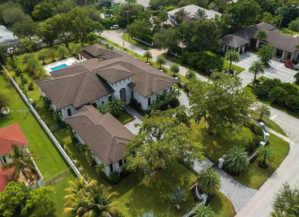 The Home in Miami is a striking brand new construction in the highly desirable Ponce-Davis area offering privacy and security now available for sale. This home located at 8341 SW 54th Ave, Miami, Florida