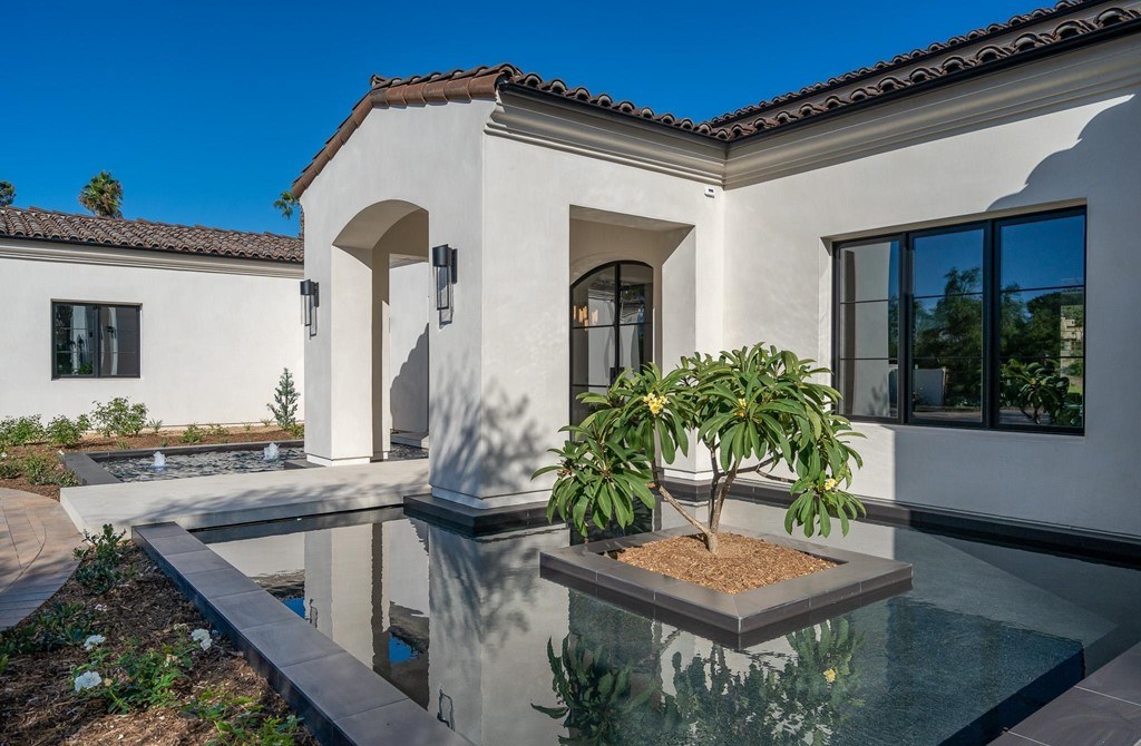 The Home in Rancho Santa Fe is a brand new construction estate set on an amazing 2.5 acre park-like setting now available for sale. This home located at 17660-62 El Vuelo, Rancho Santa Fe, California