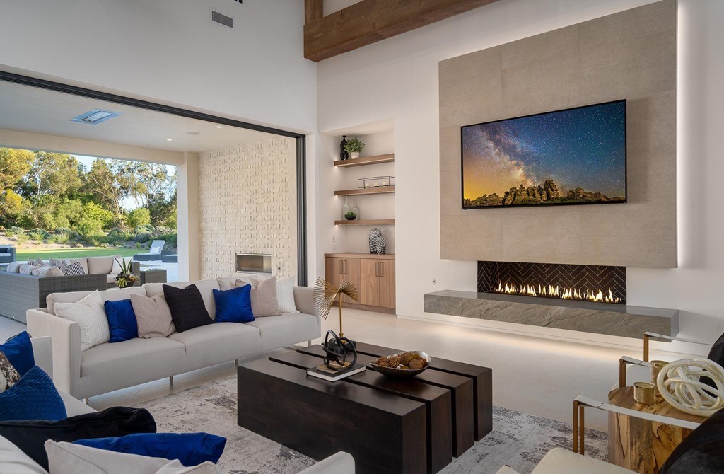 The Home in Rancho Santa Fe is a brand new construction estate set on an amazing 2.5 acre park-like setting now available for sale. This home located at 17660-62 El Vuelo, Rancho Santa Fe, California