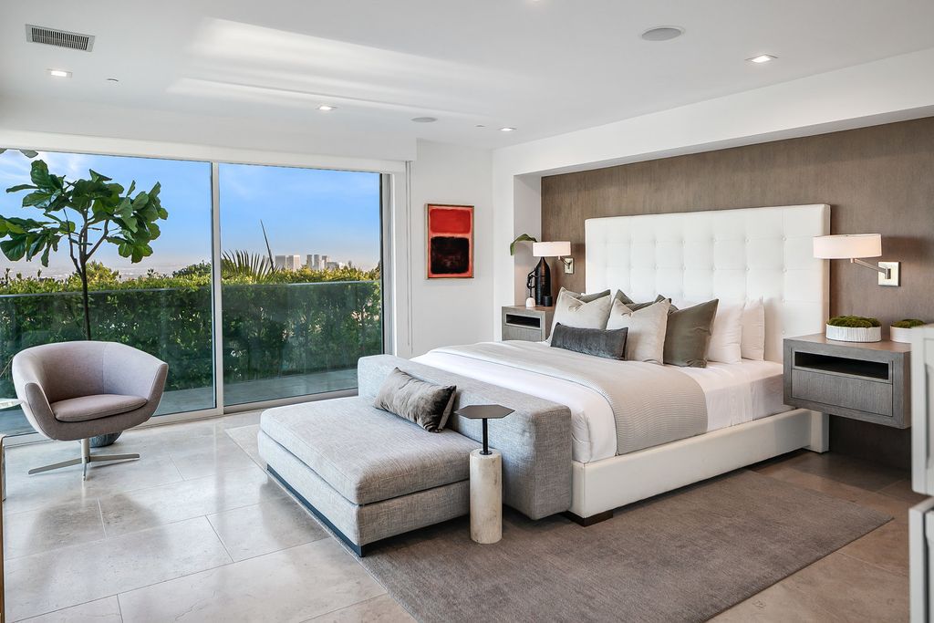 The Home in Beverly Hills is a totally remodeled and updated contemporary estate with head on city to ocean views now available for sale. This home located at 1476 Carla Rdg, Beverly Hills, California