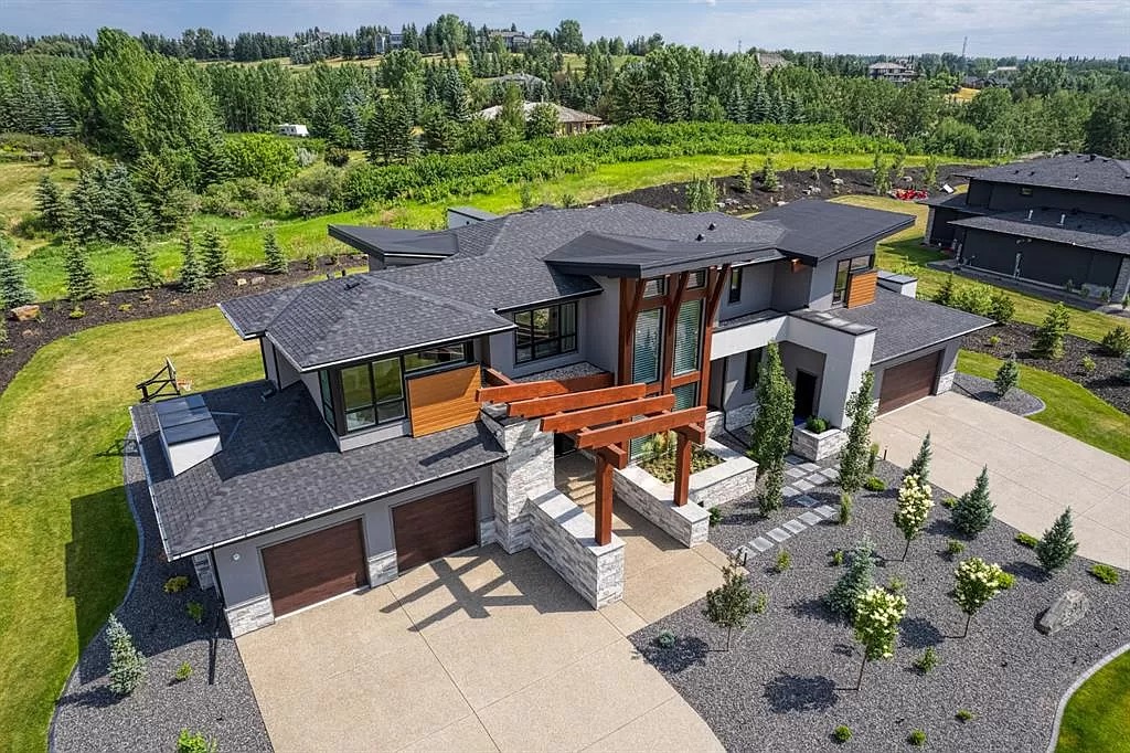 The Stunning House in Alberta is an architectural masterpiece now available for sale. This home is located at 34 S Watermark Cres, Rocky View County, AB T3L 0E9, Canada