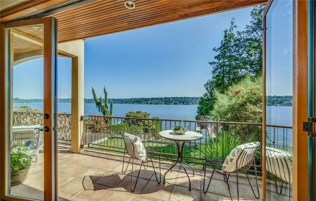 The Stunning Mediterranean Waterfront Villa in Washington features incredible views of lake now available for sale. This home is located at 7920 1/2 Seward Park Ave S, Seattle, Washington