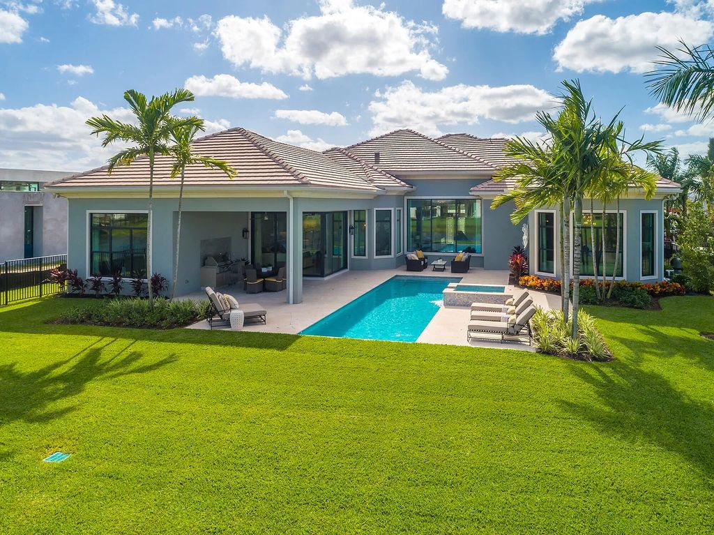 The Home in Boca Raton is a stunning transitional one story estate has Amazing custom pool with spill over spa and natural stone decking now available for sale. This home located at 17236 Brulee Breeze Way, Boca Raton, Florida